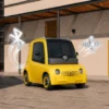 ASTRAUX AL7 – voiture électrique permis B1 – jaune en ville, vue de trois quarts avant