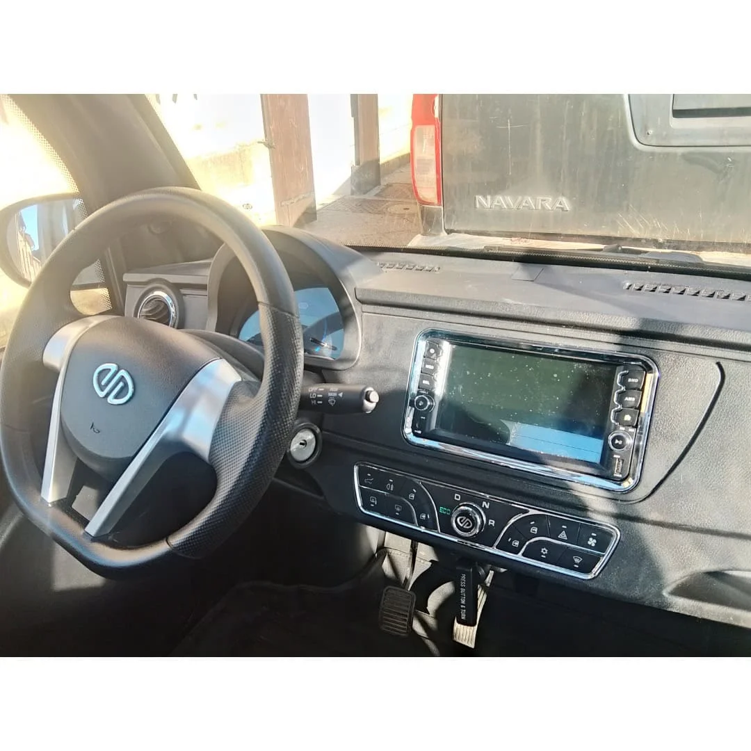 Jiayuan City Fun bleue occasion 2024 6 950 km – voiture sans permis électrique – volant et tableau de bord