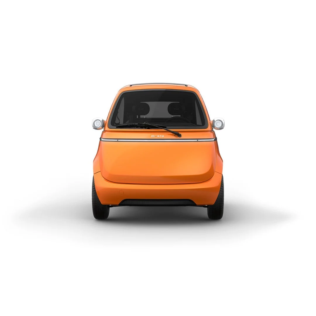 MICROLINO L7 90 km/h orange occasion 2023 4 490 km – voiture électrique permis B1 – vue de face en studio