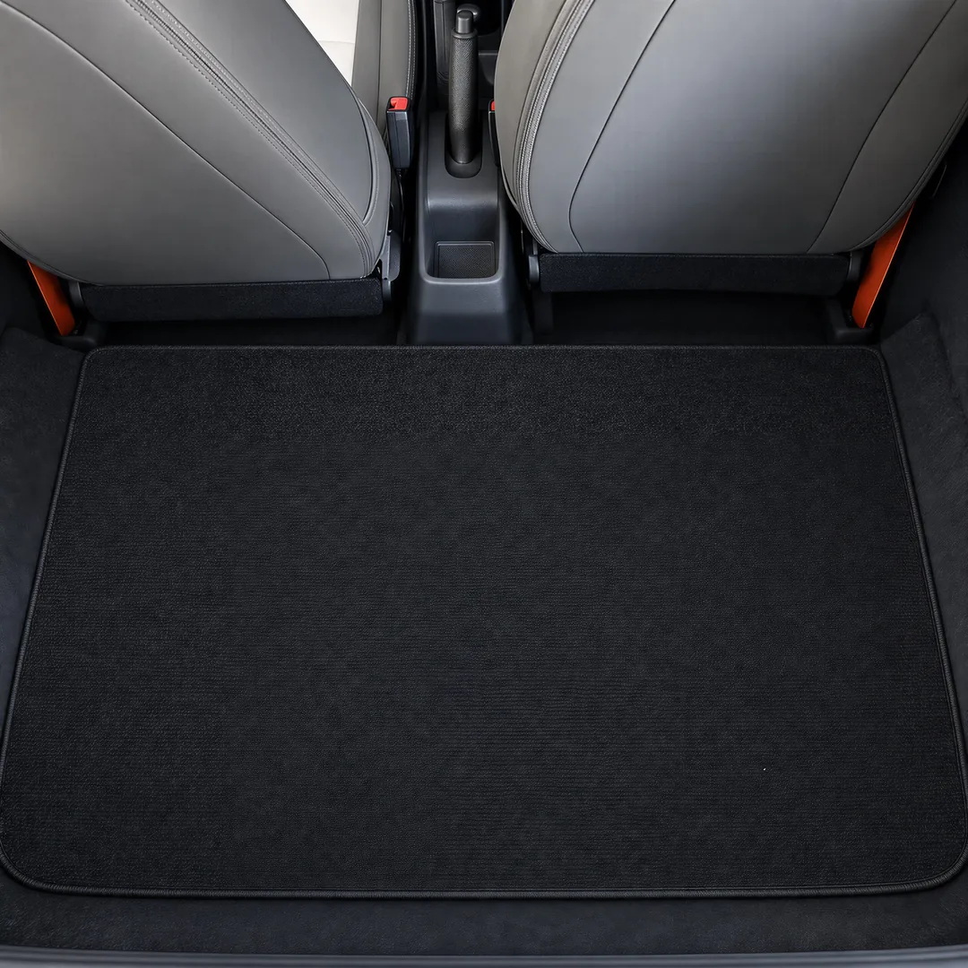 Tapis de coffre velours dans le coffre de l’Alumi